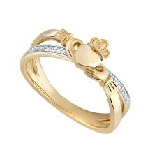 9K Gold Cz Claddagh Crossover Ring. S21152