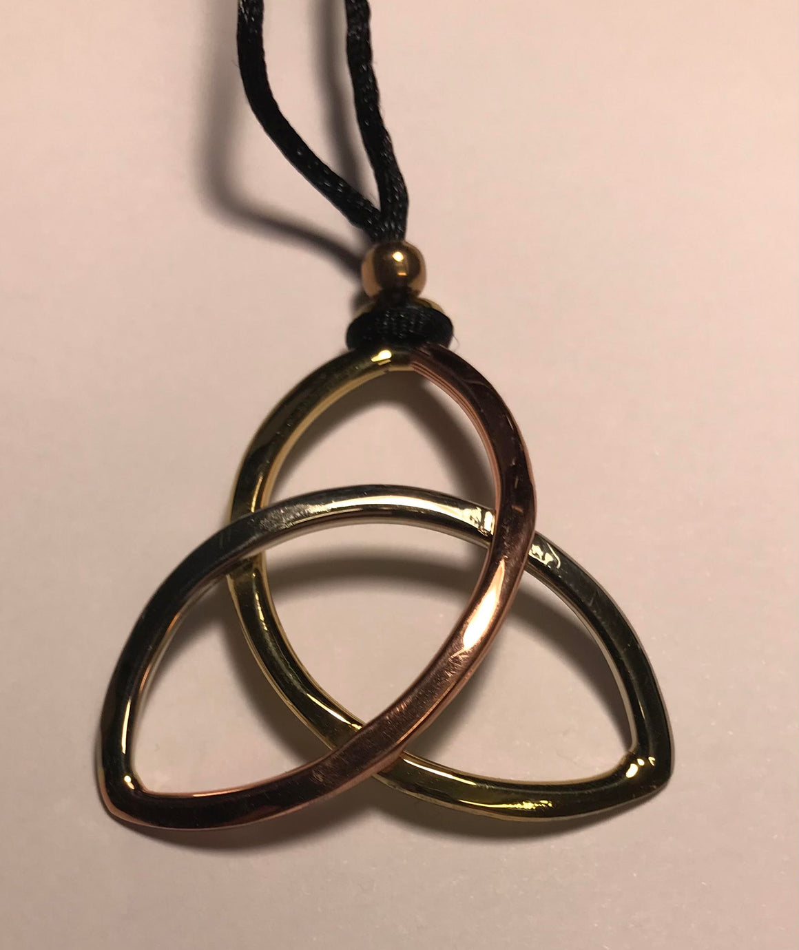 Trinity Knot Pendant with Cord .